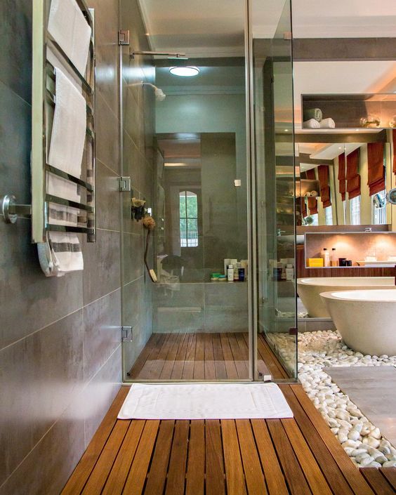 Walk-in showers with head-to-toe shower jets that connect to an inside and outside shower area, floors with radiant heat, towel warmers, and a soaker tub are important to consider when choosing items or furniture for your home