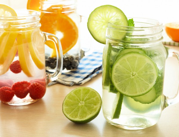 Detox water with various types of fruit in mason jars