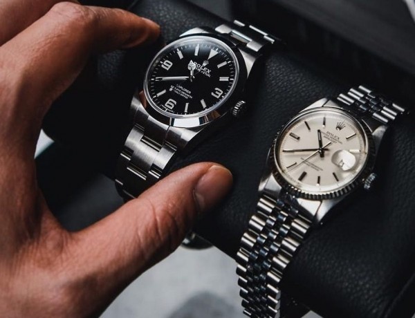 hand-holding-luxury-watches