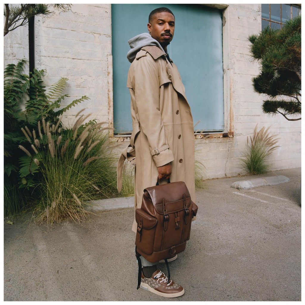 Michael B. Jordan dressed completely in Coach