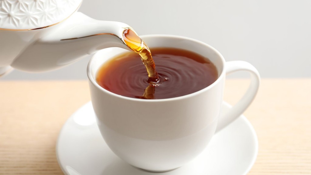 tea pouring from a kettle